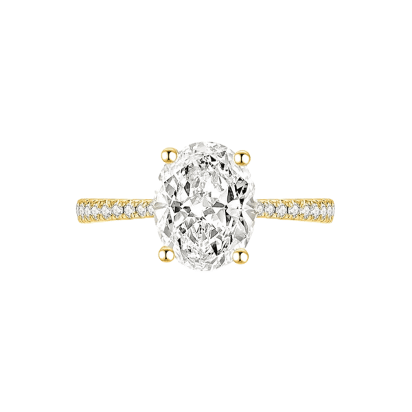 solitaire style four prong oval diamond lab-grown engagement ring with diamonds on shank in yellow gold