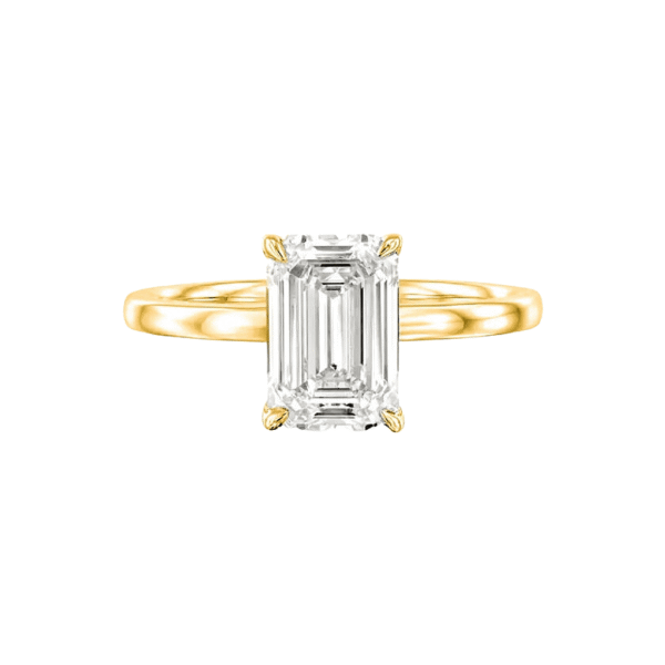 solitaire style four prong emerald cut diamond lab-grown diamond engagement ring in yellow gold