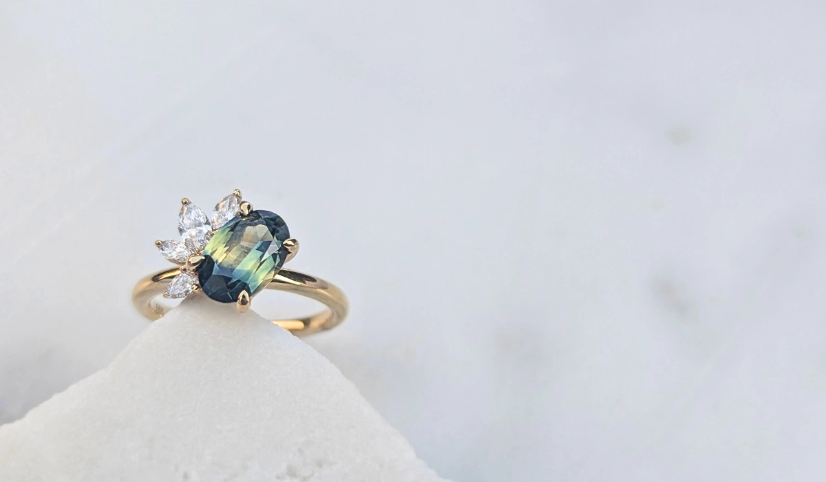 bespoke parti colour sapphire yellow gold engagement ring with diamonds