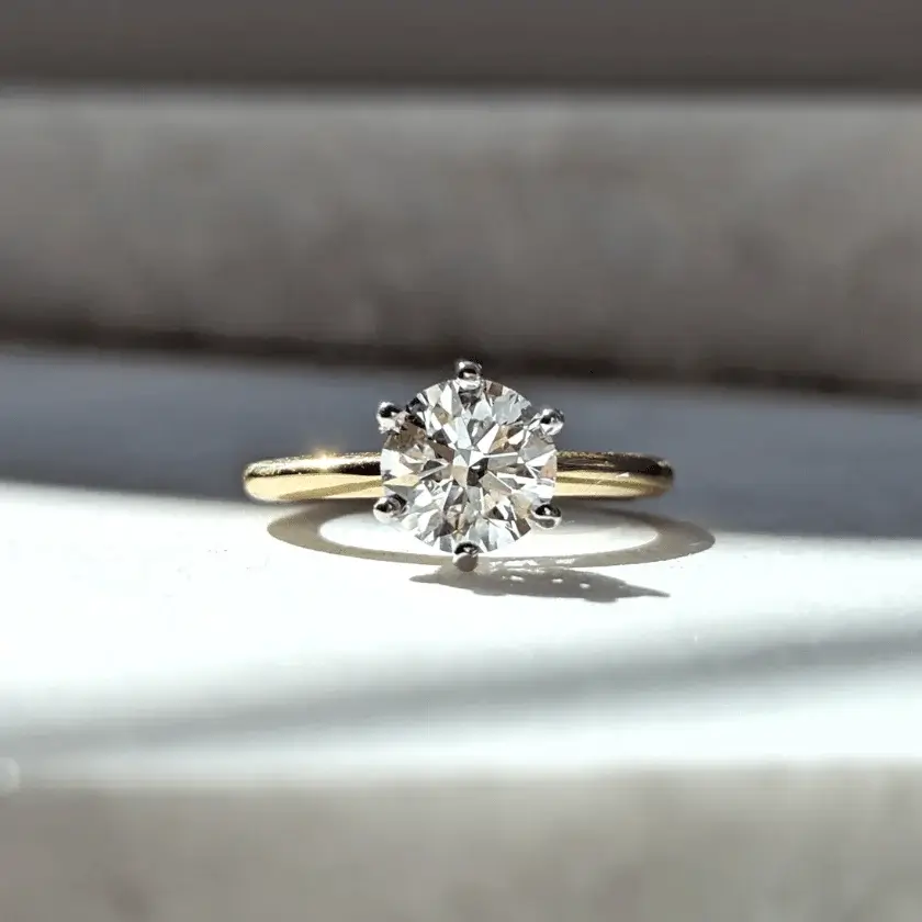 yellow gold round brilliant diamond engagement ring