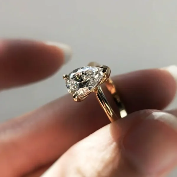 Pear shape solitaire diamond engagement ring